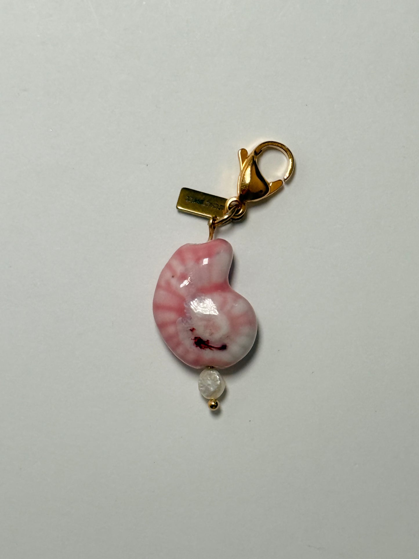 Charm ''SUERTE'' rosa
