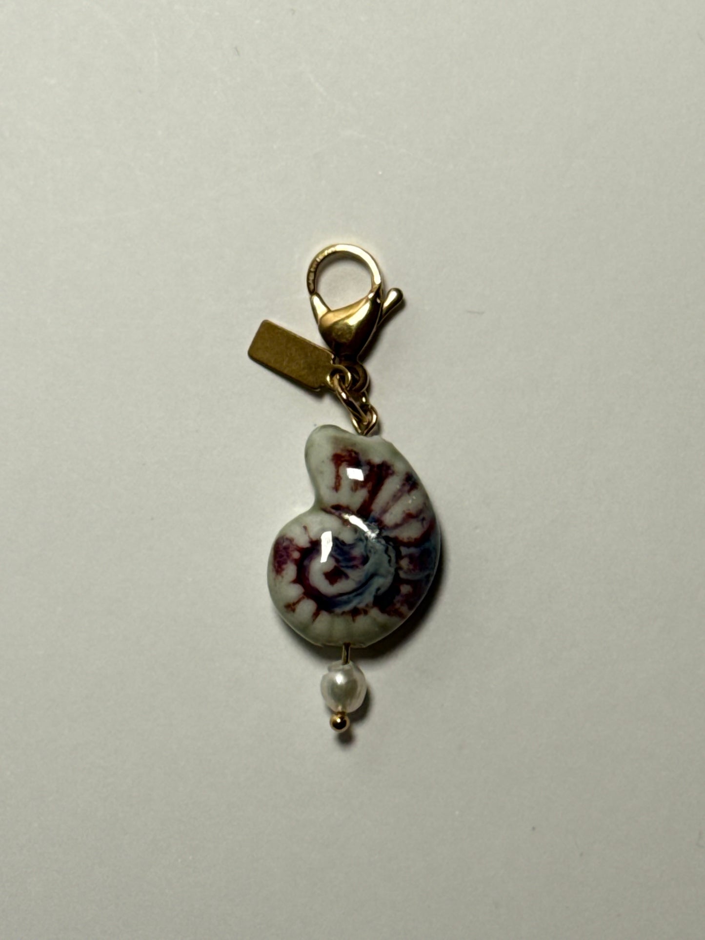 Charm ''SUERTE'' tonos lilas y granates